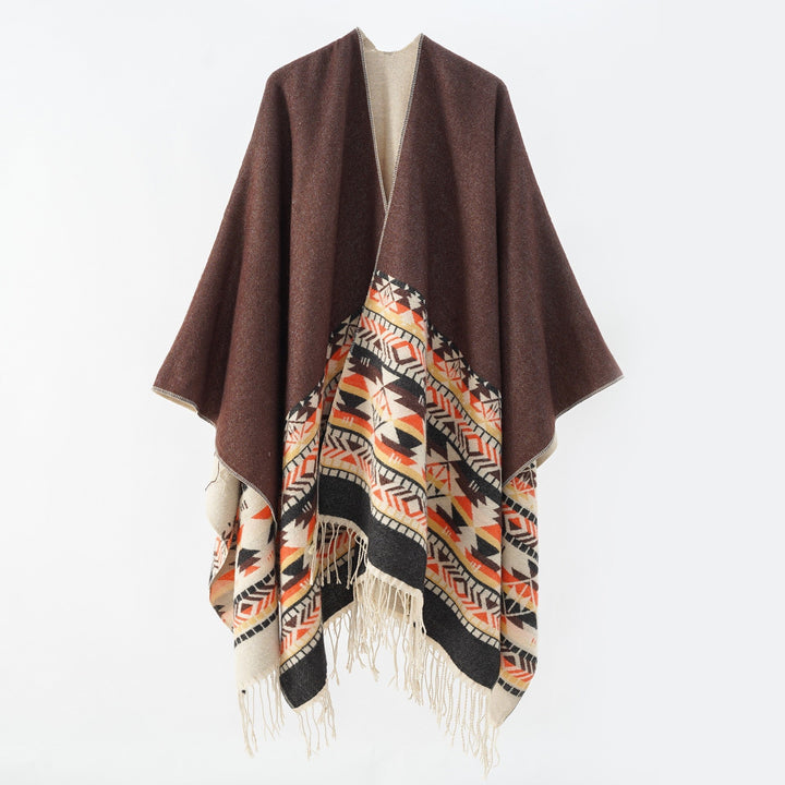 Dam Oversize Reversible poncho tillverkad av ullblandning med Ethno Jacquard och fransfåll