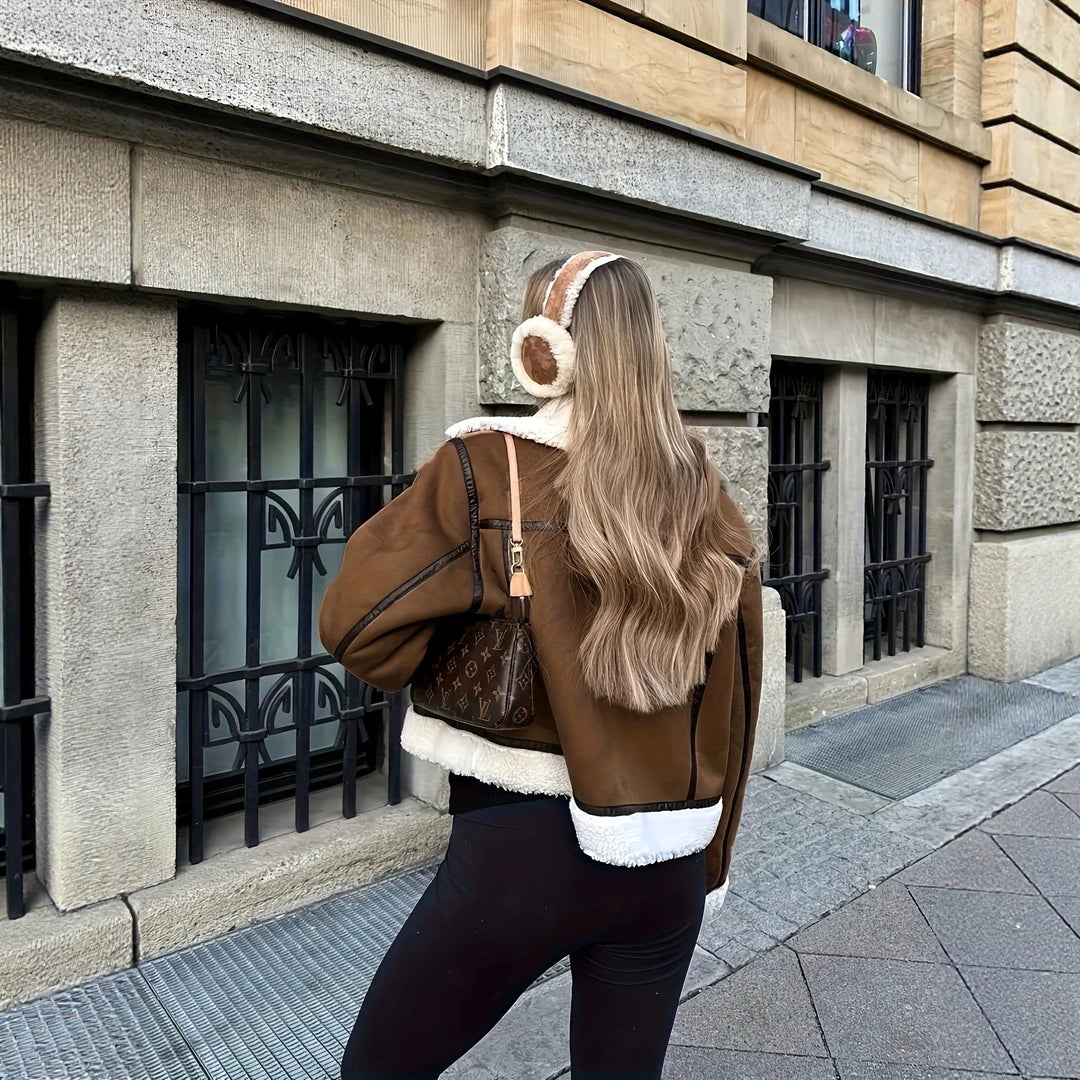 Dam avslappnad och varm Sheepskin jacka
