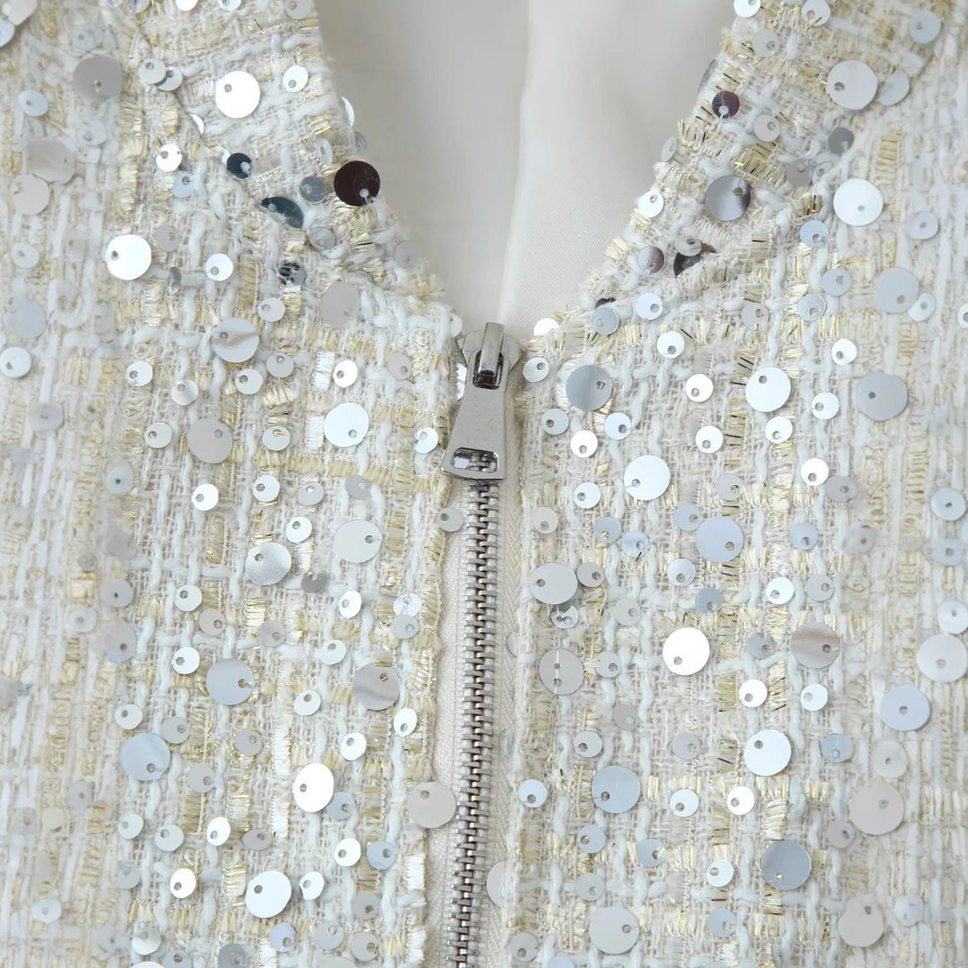 Dam glansig sequin boxy jacka med ståkrage, concealed dragkedja, och elastiska muddar
