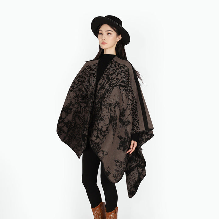 Dam jacquard stickad cape med ståkrage och graphic forest design