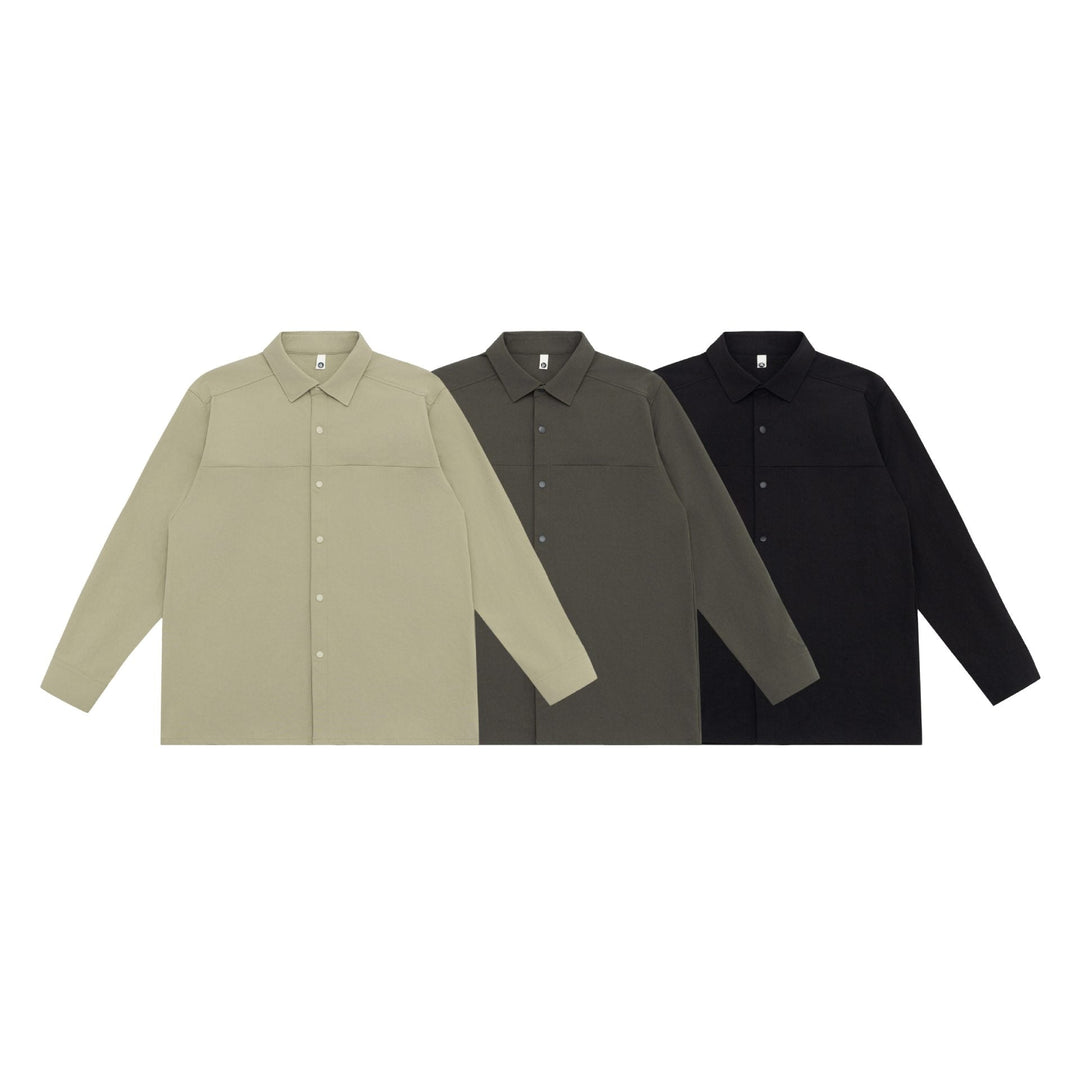 Unisex Lång Modell Skjorta Jacka i Boxig Skärning Gjord av Kraftig Sweat Quality med Concealed Tryckknappsslå