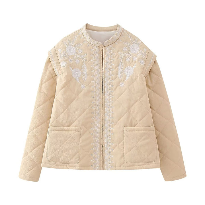 Dam quiltad jacka med floral embroidery kant, straight skärning och rund hals