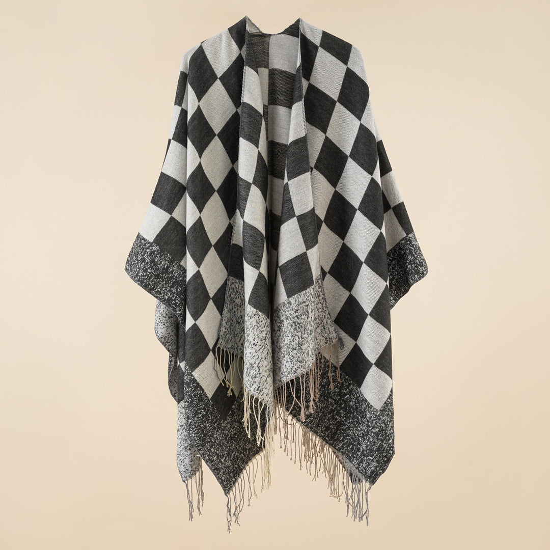 Dam oversized woven poncho med diamond mönster och fringes