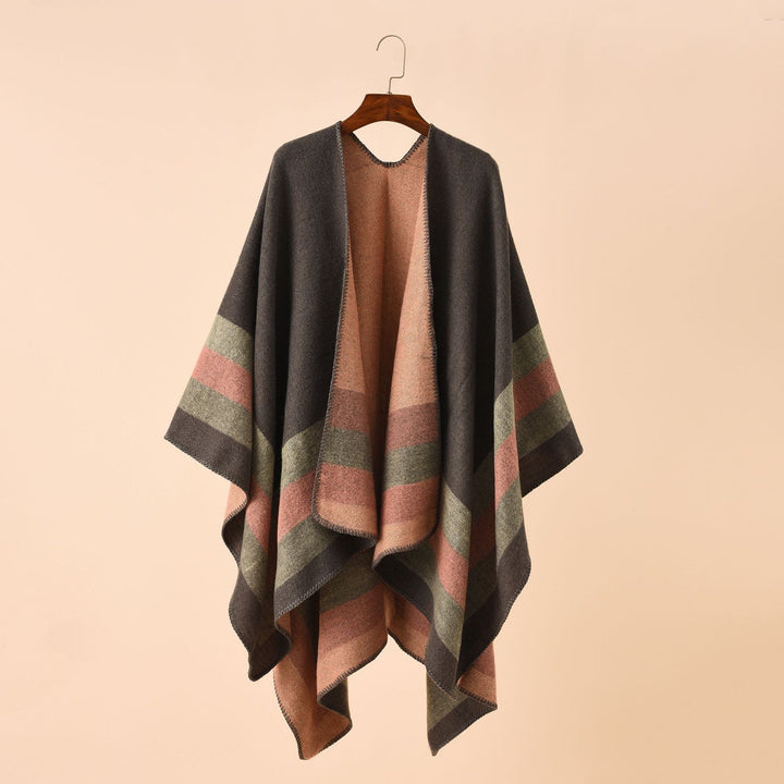 Dam ull-look poncho med asymmetrical block stripes och decorative stitch edge