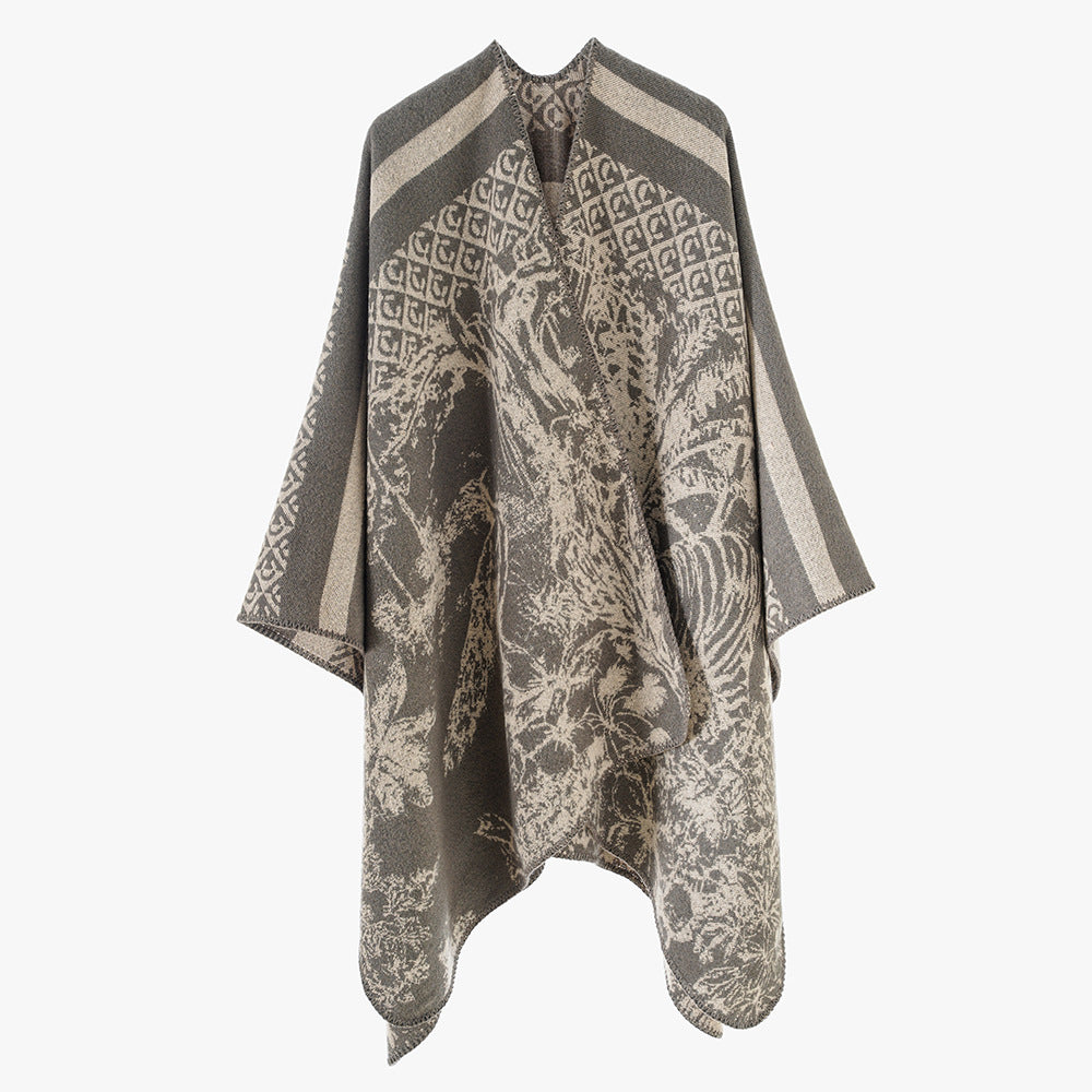Dam jacquard stickad cape med ståkrage och graphic forest design