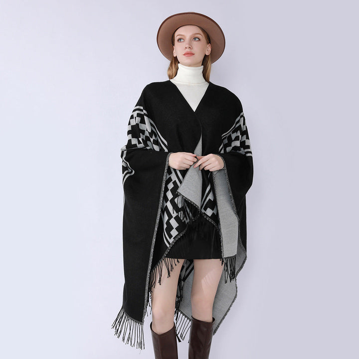 Dam Oversize Cape med geometric Jacquard, fransfåll och reversible function