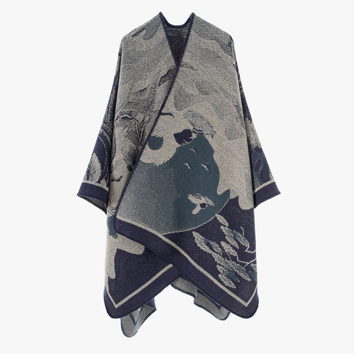 Dam jacquard cape med graphic floral motif och boxy oversized skärning