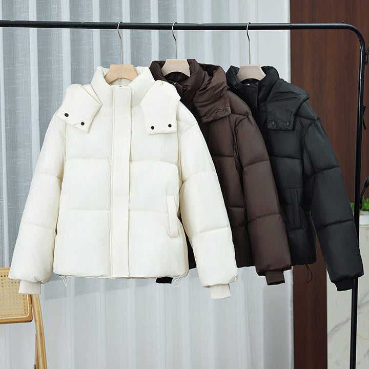 Dam nano compact thermal quiltad jacka med high sjalkrage, concealed front placket, och internal fåll drawstring