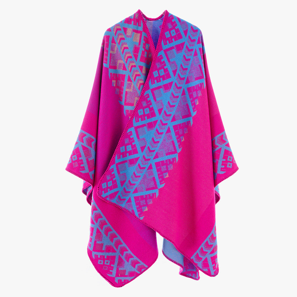 Dam capeponcho i woven ethnic jacquard tillverkad av ullblandning med zigzag fåll edge