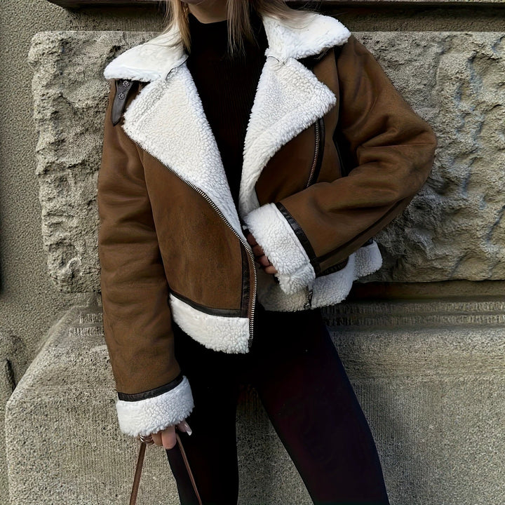 Dam avslappnad och varm Sheepskin jacka