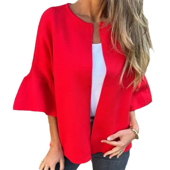 Dam kort jacka gjord textured knit med 3/4 balloon ärmar