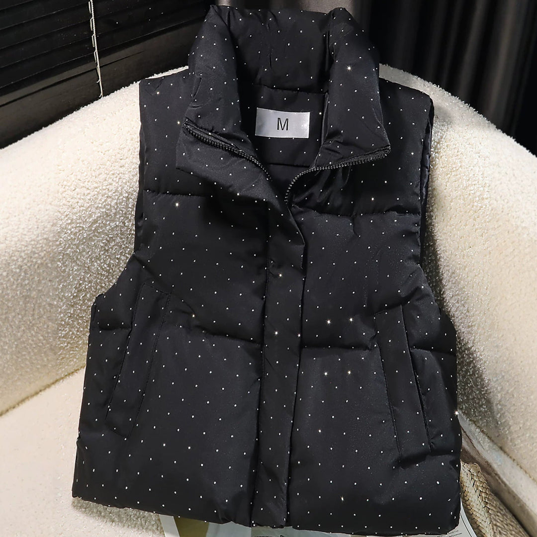 Dam non-quiltad sleeveless thermal väst med high standing krage, concealed dragkedja placket, och fine dot tryck
