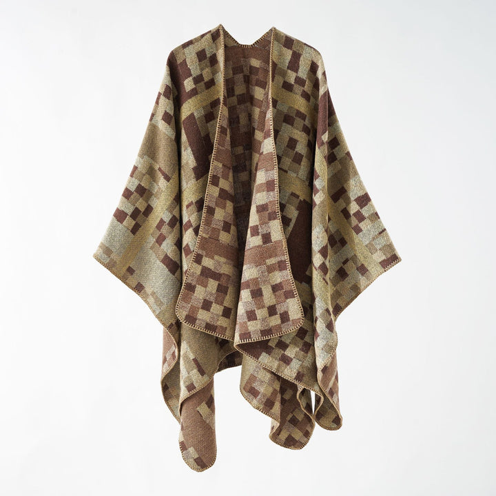 Dam Kastiger Web poncho med graphic jacquard och fringe edge