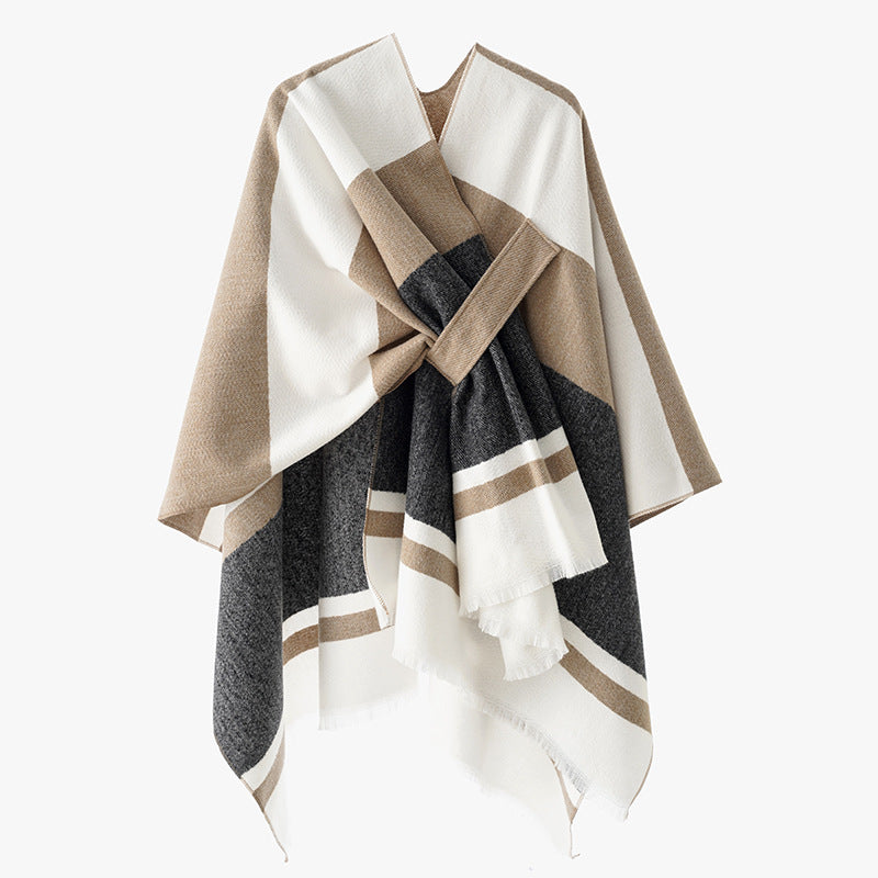 Dam oversized capeponcho tillverkad av ullblandning med tie loop och randig border