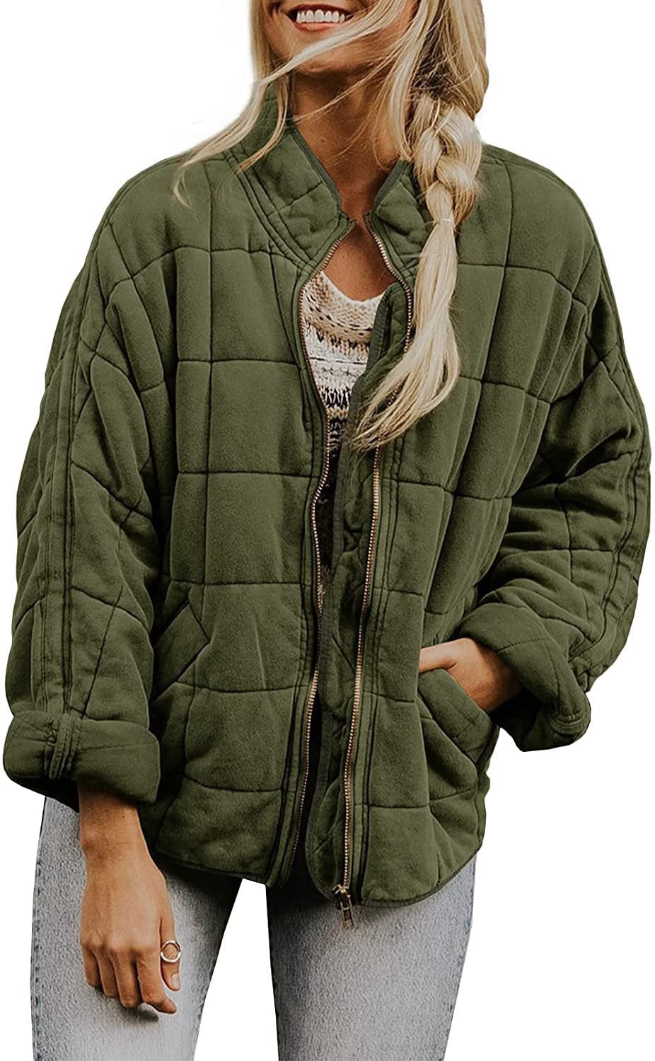 Dam oversize kviltad jacka med dragkedja och sidofickor