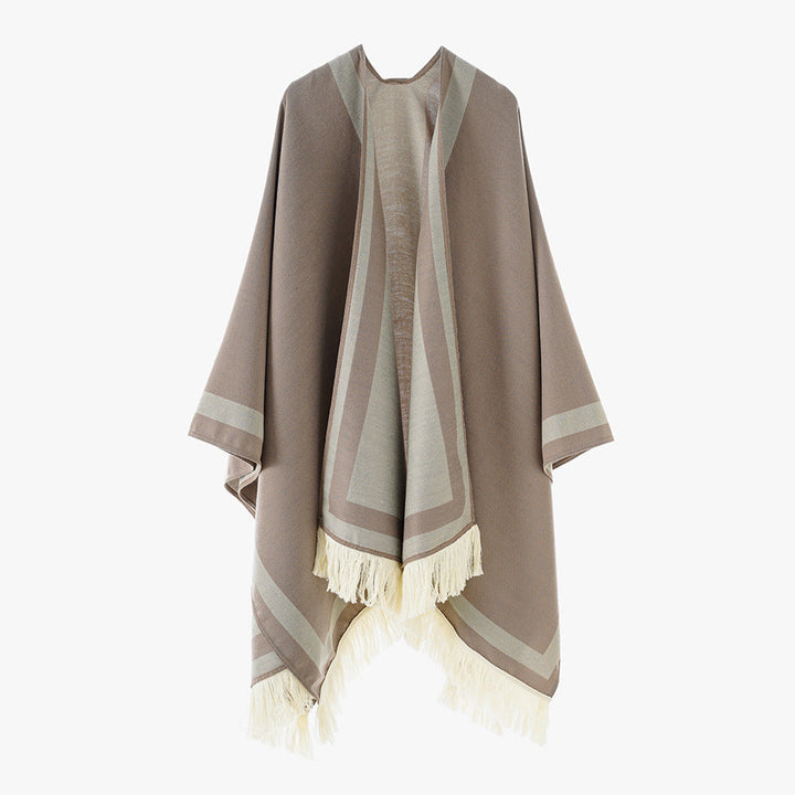 Dam quiltad oversized capeponcho i kimono skärning med kontrast kant och fransfåll