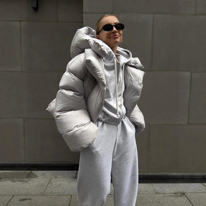 Dam extravagant oversize kviltad down jacka med extra voluminous huva