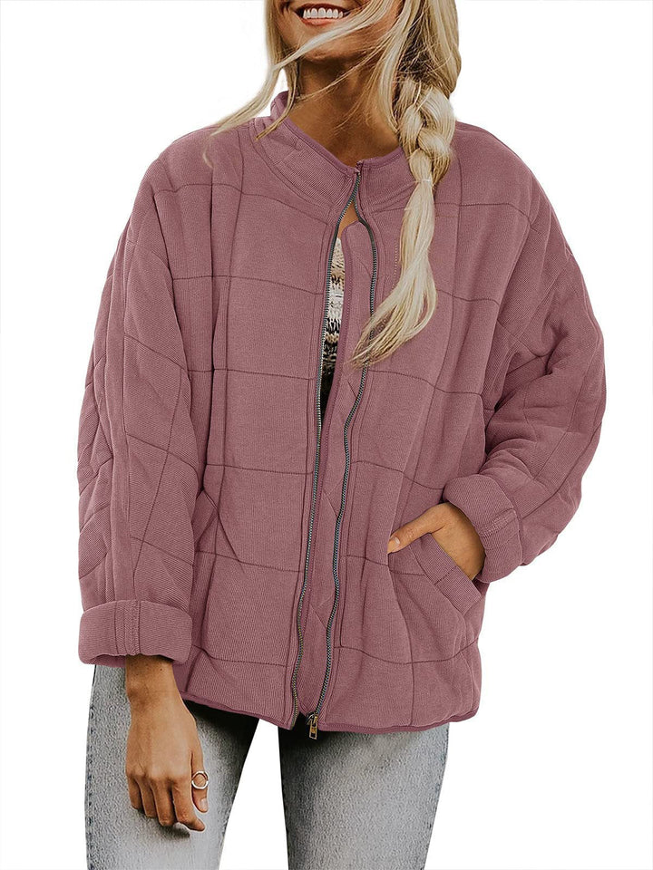 Dam oversize kviltad jacka med dragkedja och sidofickor