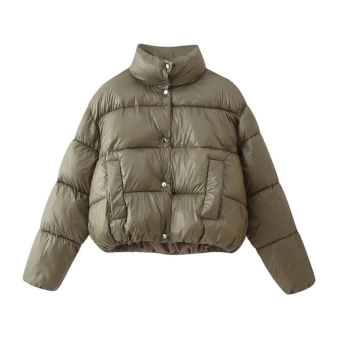 Dam kort skärning quiltad oversized down look jacka med ståkrage och elastisk fåll