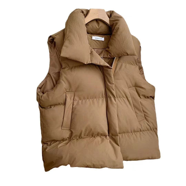 Dam kort vadderad quiltad väst med high sjalkrage och adjustable drawstring fåll