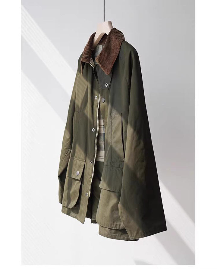 Dam vattenavvisande oversize field jacka med corduroy krage och flap fickor