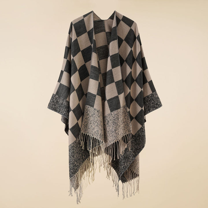 Dam oversized woven poncho med diamond mönster och fringes