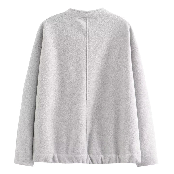 Dam kort boxy jacka i ullblandning med kort ståkrage, concealed front placket och påsydda fickor