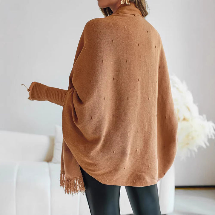 Dam Fringe poncho kofta med decorative midjebälte och ribbstickade muddar