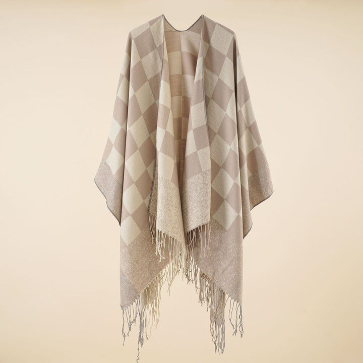 Dam oversized woven poncho med diamond mönster och fringes