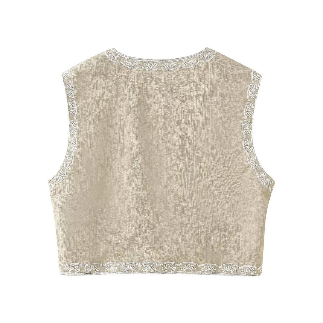 Dam embroidered kort väst med floral embroidery, öppen front och fine fåll decoration