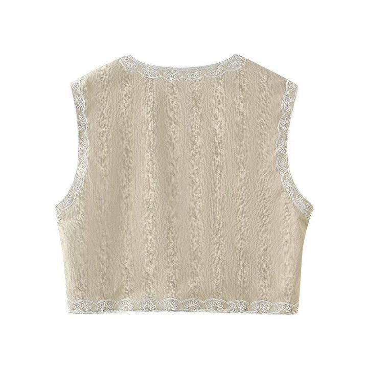 Dam embroidered kort väst med floral embroidery, öppen front och fine fåll decoration
