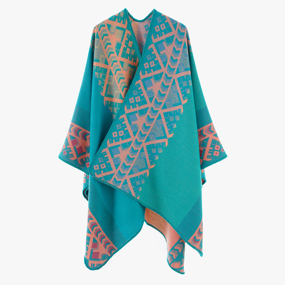 Dam capeponcho i woven ethnic jacquard tillverkad av ullblandning med zigzag fåll edge