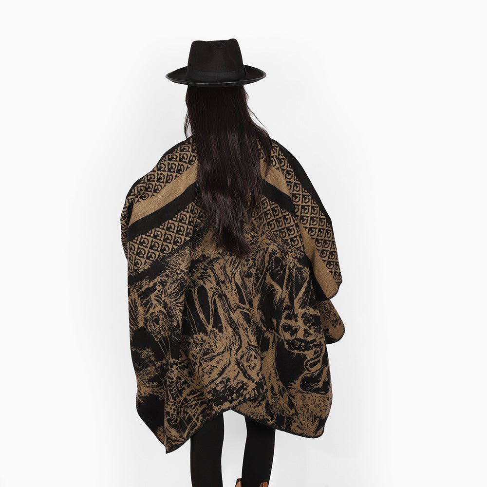 Dam jacquard stickad cape med ståkrage och graphic forest design