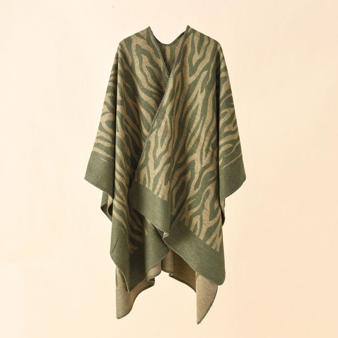 Dam Zebra Jacquard poncho Cape i oversized kimono passform tillverkad av mjuk fine stickad