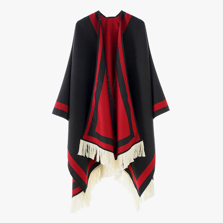 Dam quiltad oversized capeponcho i kimono skärning med kontrast kant och fransfåll