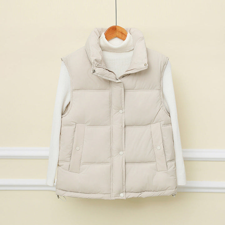 Dam non-vadderad sleeveless thermo quiltad väst med extra high standing krage och concealed snap knäppning