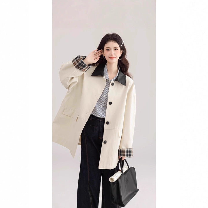 Dam oversize trenchcoat med kontrast krage och rutig foder