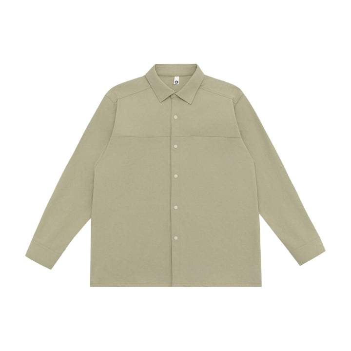 Unisex Lång Modell Skjorta Jacka i Boxig Skärning Gjord av Kraftig Sweat Quality med Concealed Tryckknappsslå