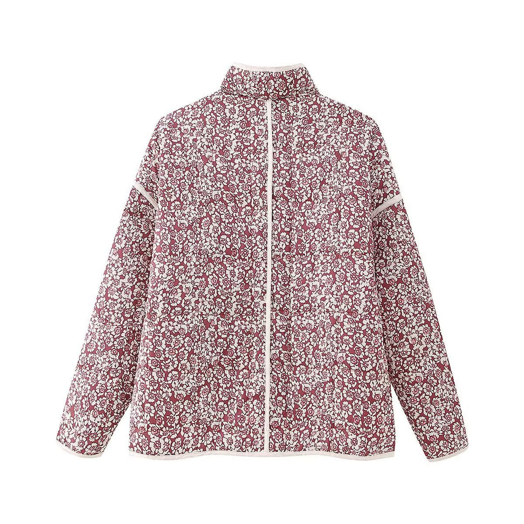 Dam quiltad kort jacka med floral alla-över tryck, light vaddering, ståkrage, och påsydda fickor