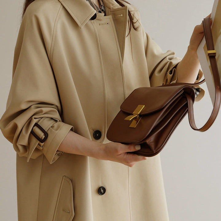 Dam Midi-oversize trenchcoat med Storm Flap och justerbar muddar