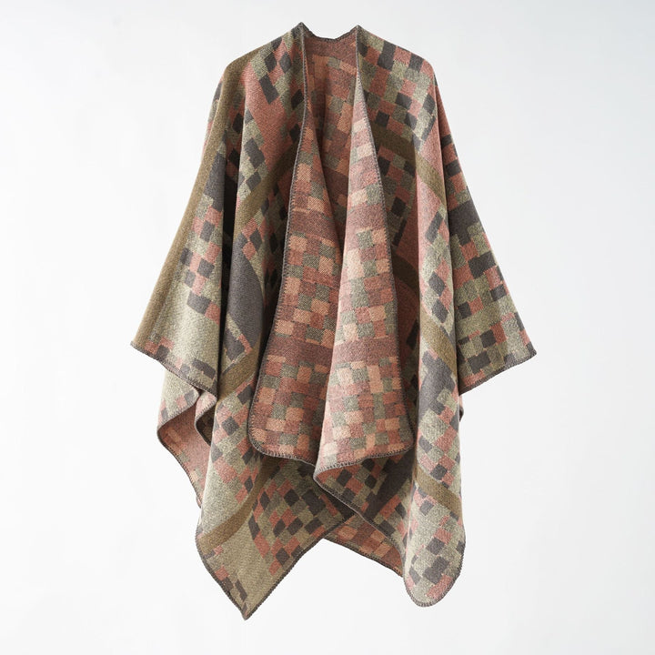 Dam Kastiger Web poncho med graphic jacquard och fringe edge