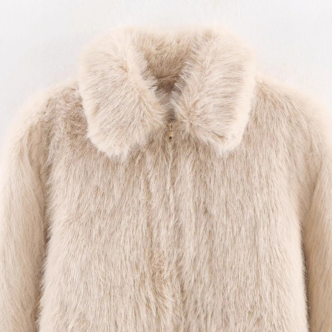 Dam cropped faux pälsjacka i en voluminous lapel krage
