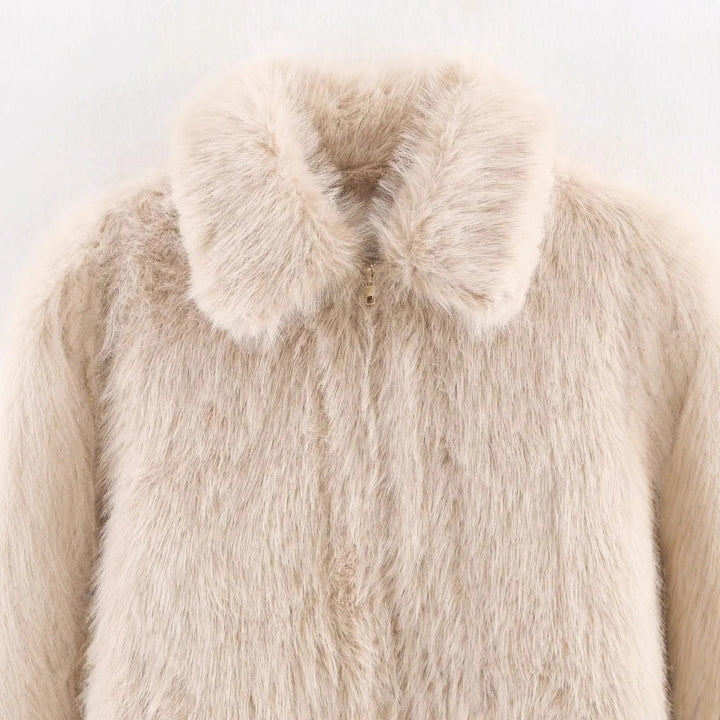 Dam cropped faux pälsjacka i en voluminous lapel krage