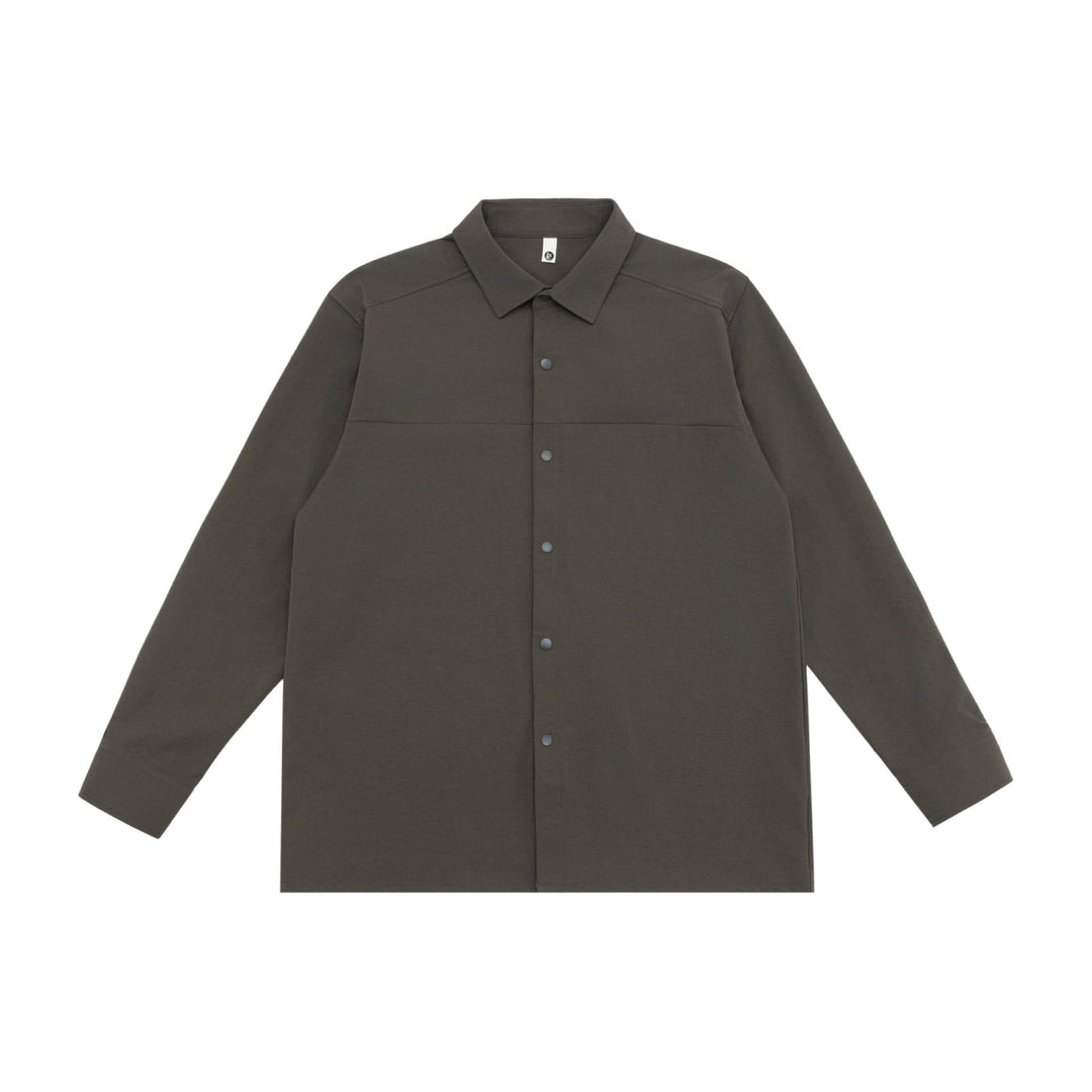 Unisex Lång Modell Skjorta Jacka i Boxig Skärning Gjord av Kraftig Sweat Quality med Concealed Tryckknappsslå