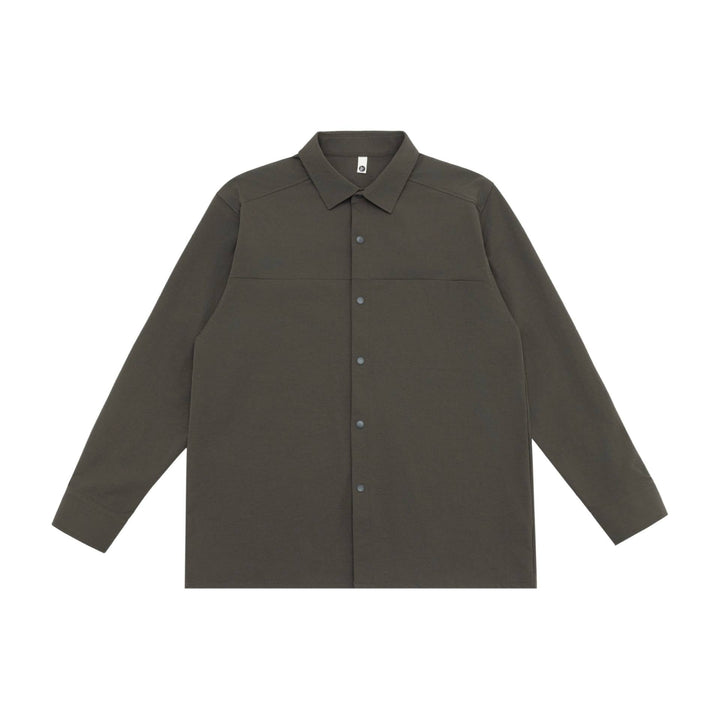 Unisex Lång Modell Skjorta Jacka i Boxig Skärning Gjord av Kraftig Sweat Quality med Concealed Tryckknappsslå