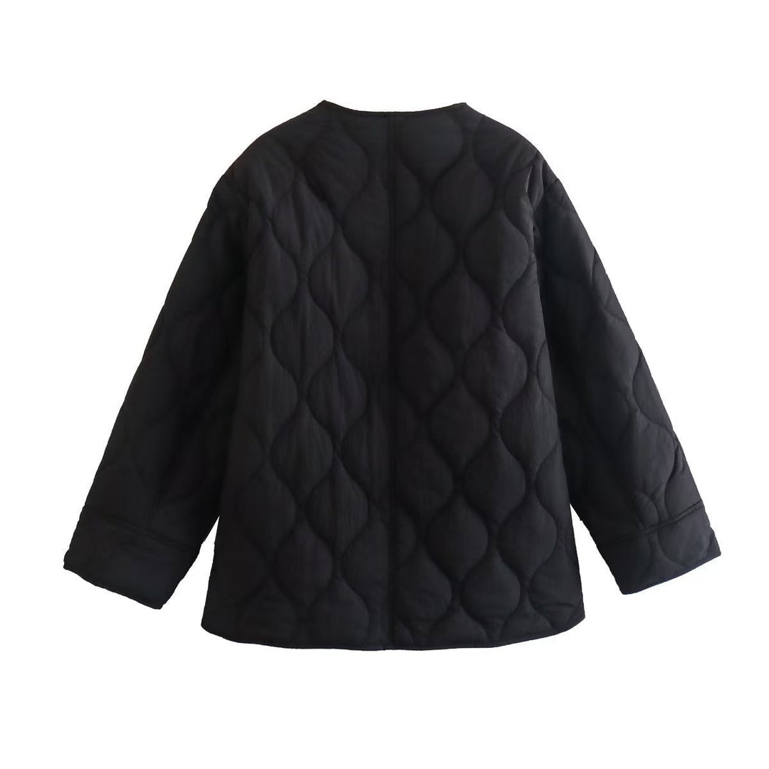 Dam vadderad oversized jacka med rund hals och organic diamond stitching