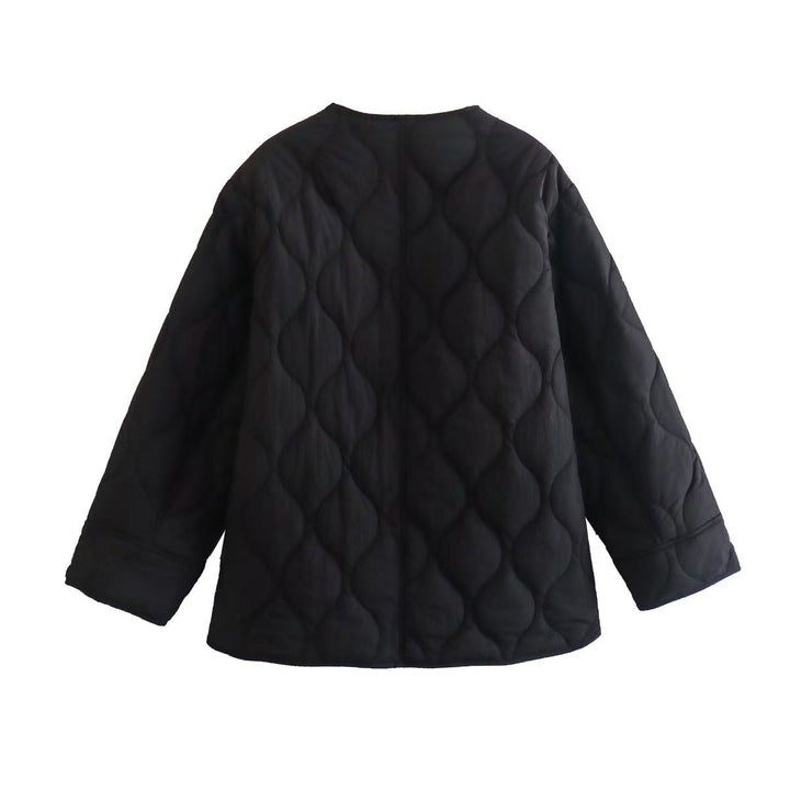 Dam vadderad oversized jacka med rund hals och organic diamond stitching
