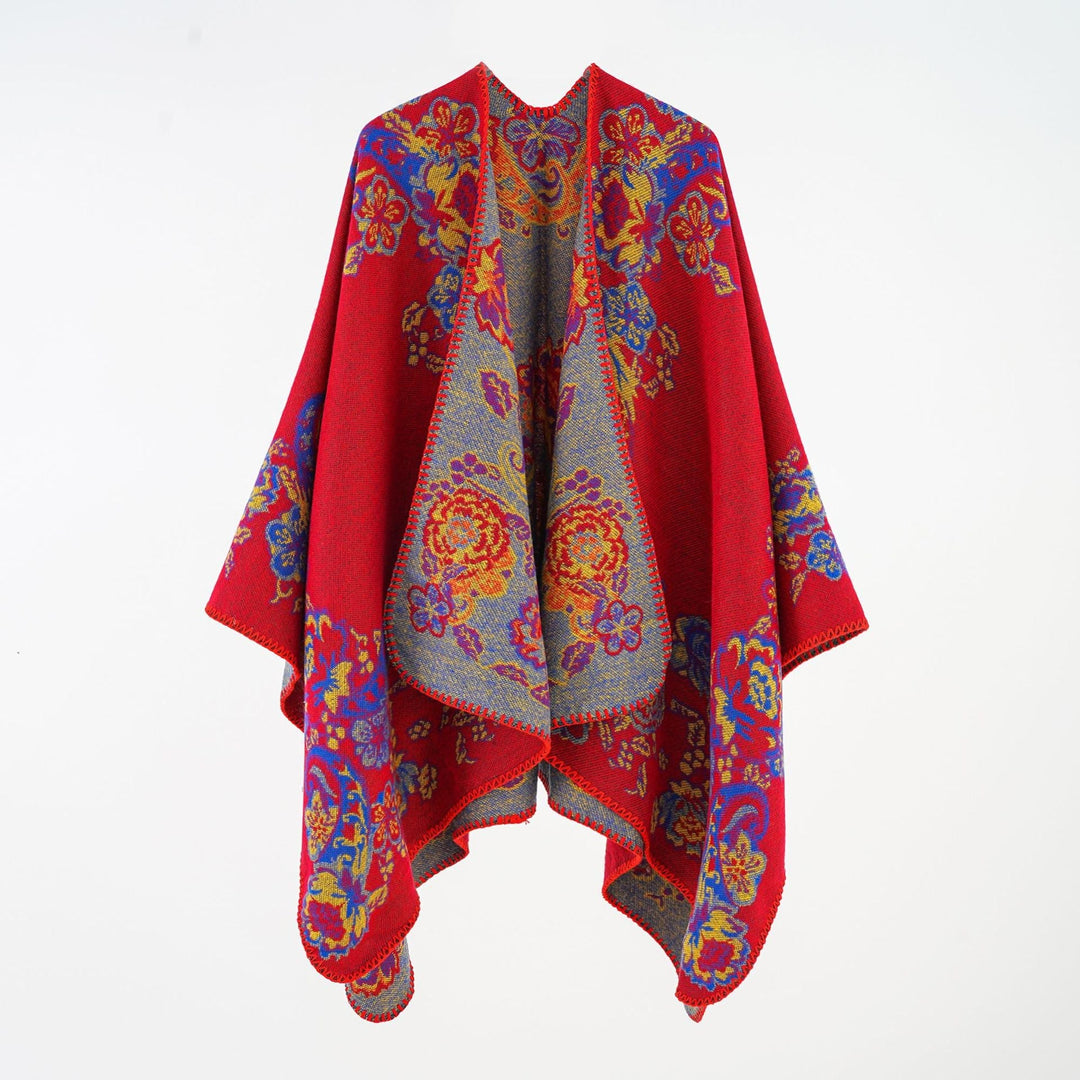 Dam jacquard poncho tillverkad av ullblandning med blommigt mönster och overlock edge