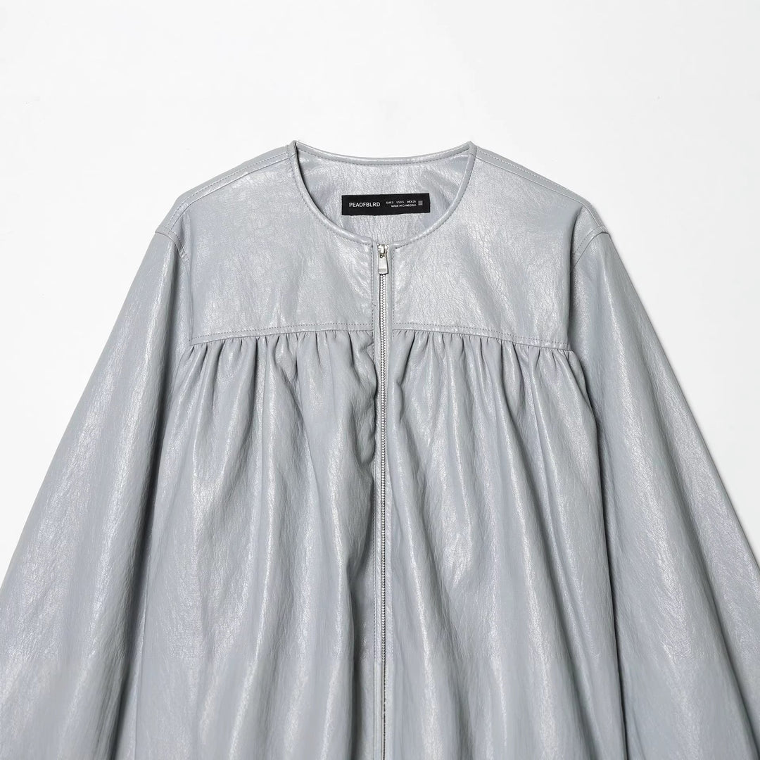 Dam kort glansig oversized bomberjacka med gathered chest yoke och voluminous balloon ärmar
