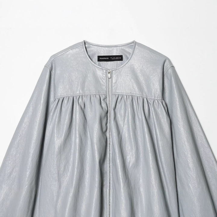 Dam kort glansig oversized bomberjacka med gathered chest yoke och voluminous balloon ärmar